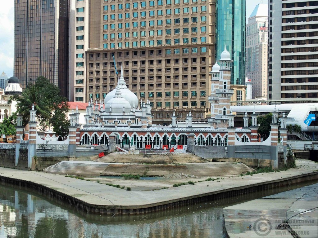 The Masjid Jamek, dwarfed by its surroundings