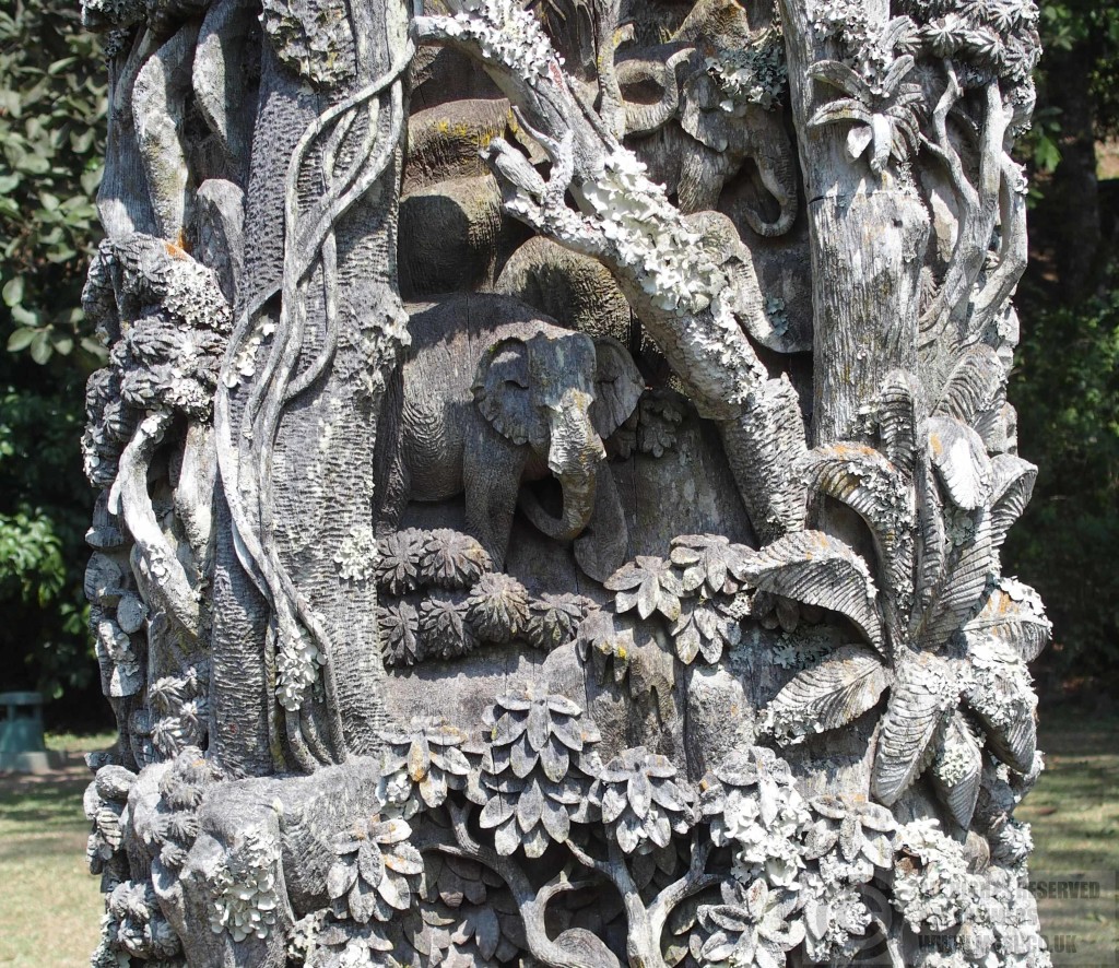Carved wooden post in Bhubing gardens